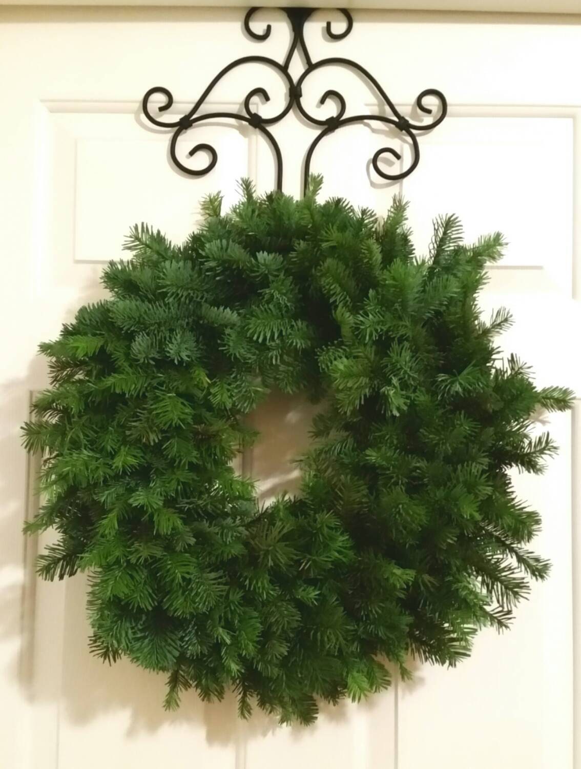 Handmade undecorated Christmas wreath with oregon noble boughs treated for freshness throughout the holidays!