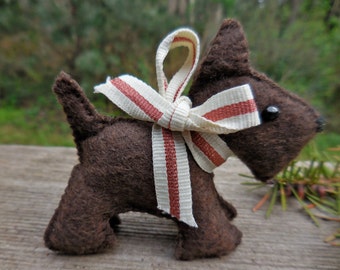 small brown stuffed dog