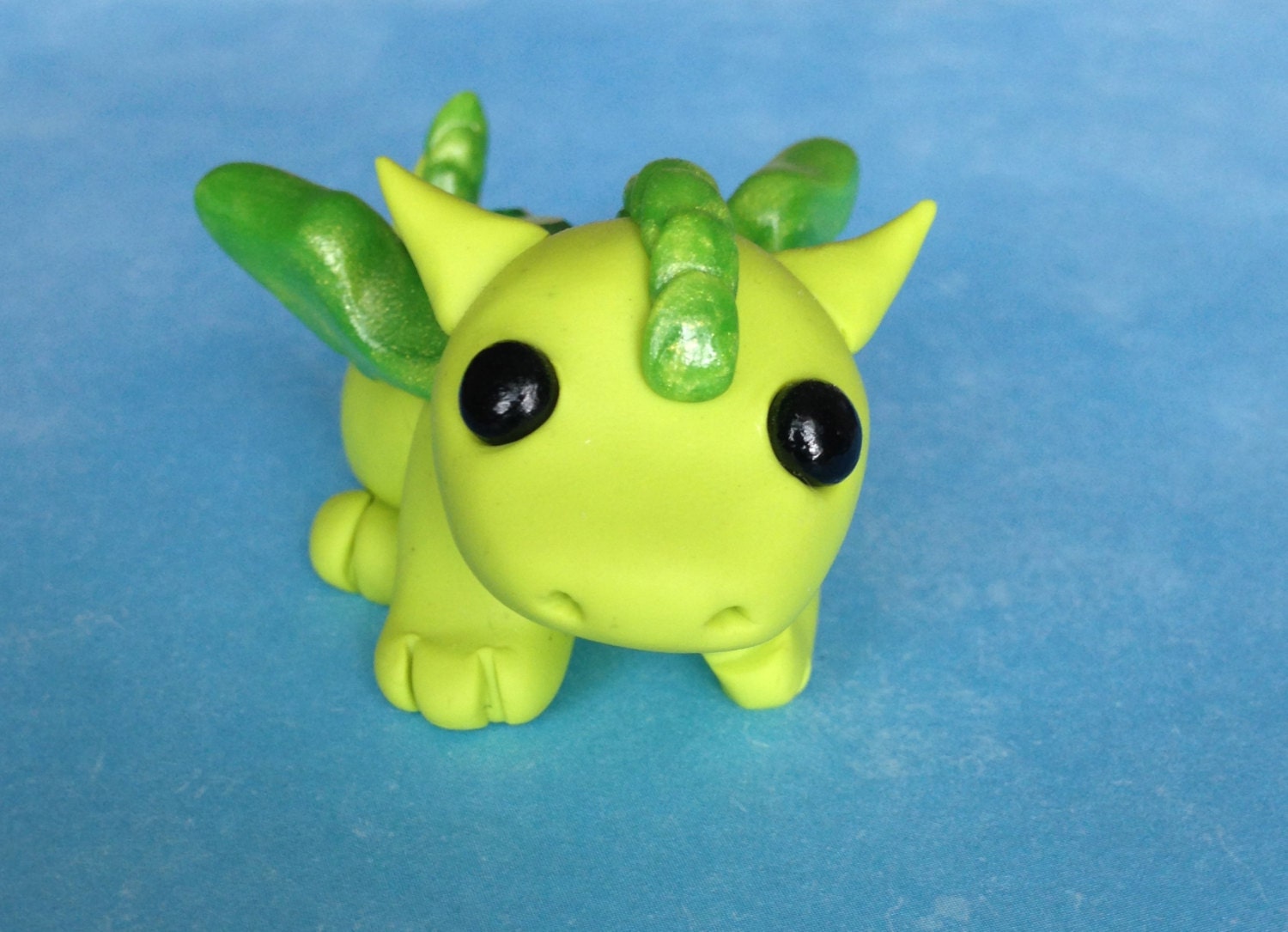 little green dragon figurines