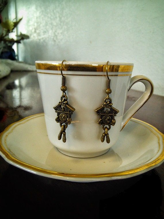 Items similar to Antique Bronze Cuckoo Clock Earrings on Etsy