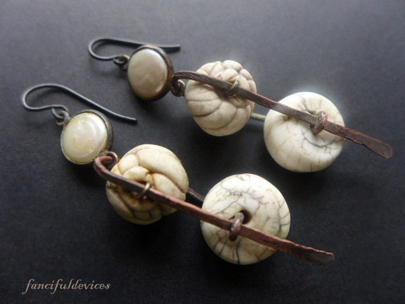 Achroous. White rustic assemblage earrings with pearl polymer and Nepalese naga conch.