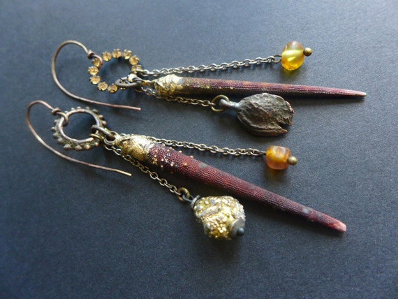 Halcyon. Rustic assemblage asymmetrical earrings with sea urchin spines and Baltic amber bits.