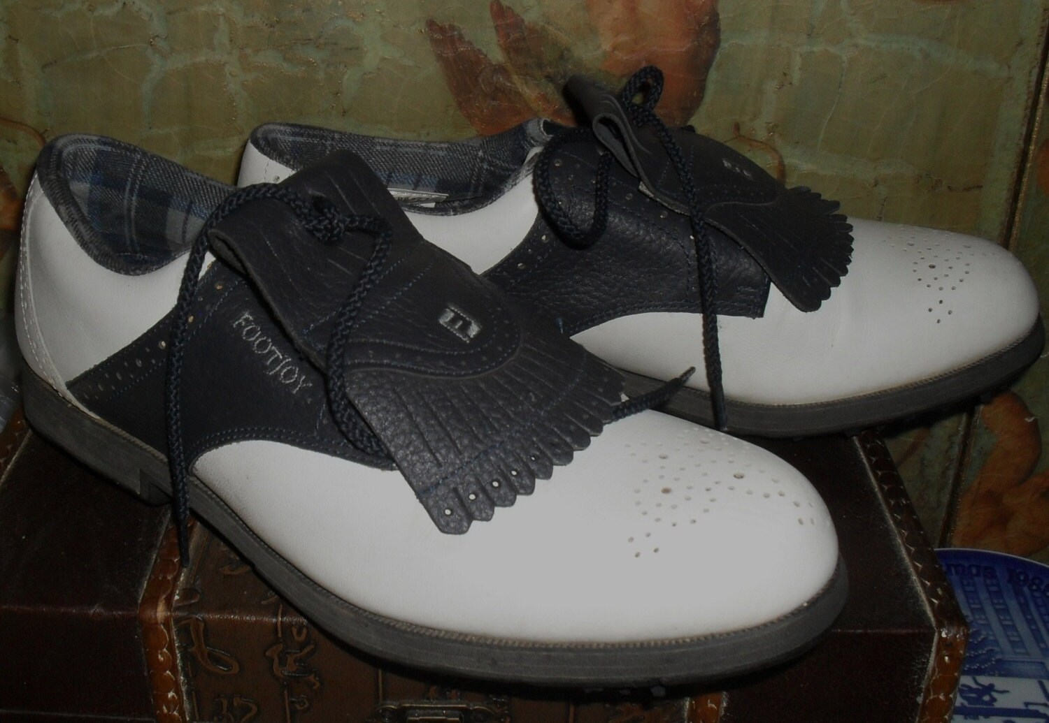 black and white saddle golf shoes