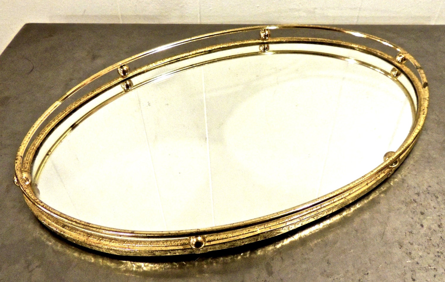 vintage mirrored tray 1950s60s brass hollywood regency mid century oval mirror tray Haute Juice