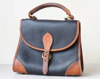 Vintage Black and Brown Dooney and Bourke purse // Leather Purse // Dooney handbag// duck purse //