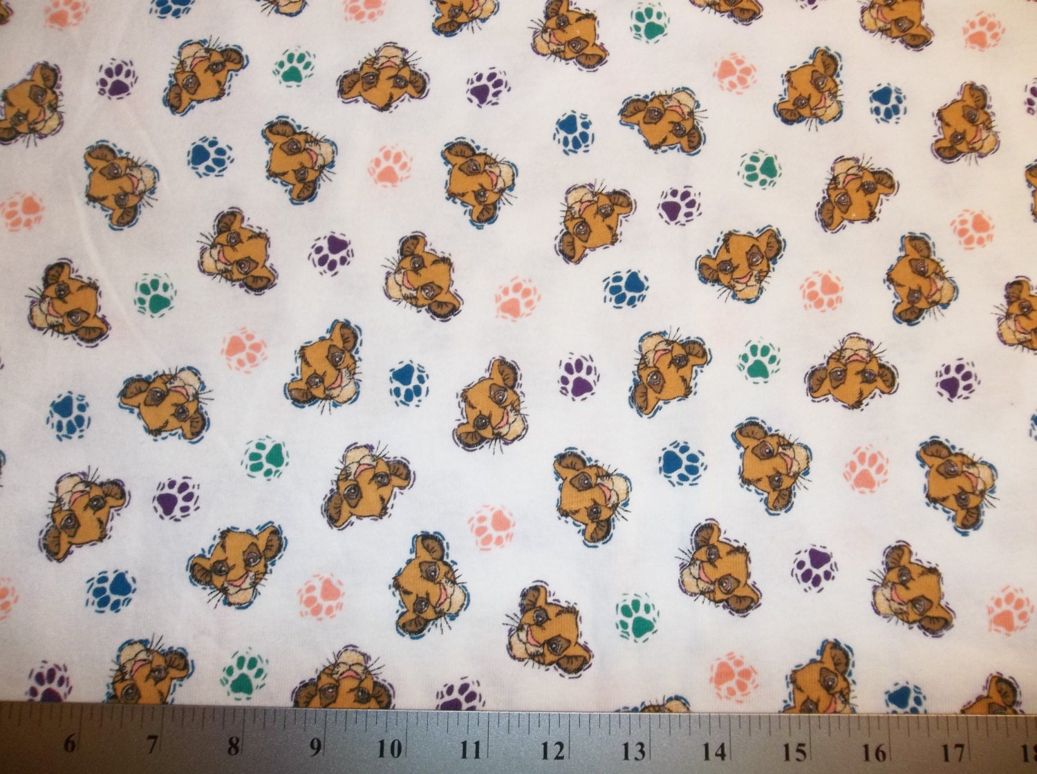 Lion King Simba Faces and Paw Prints on White Background Soft