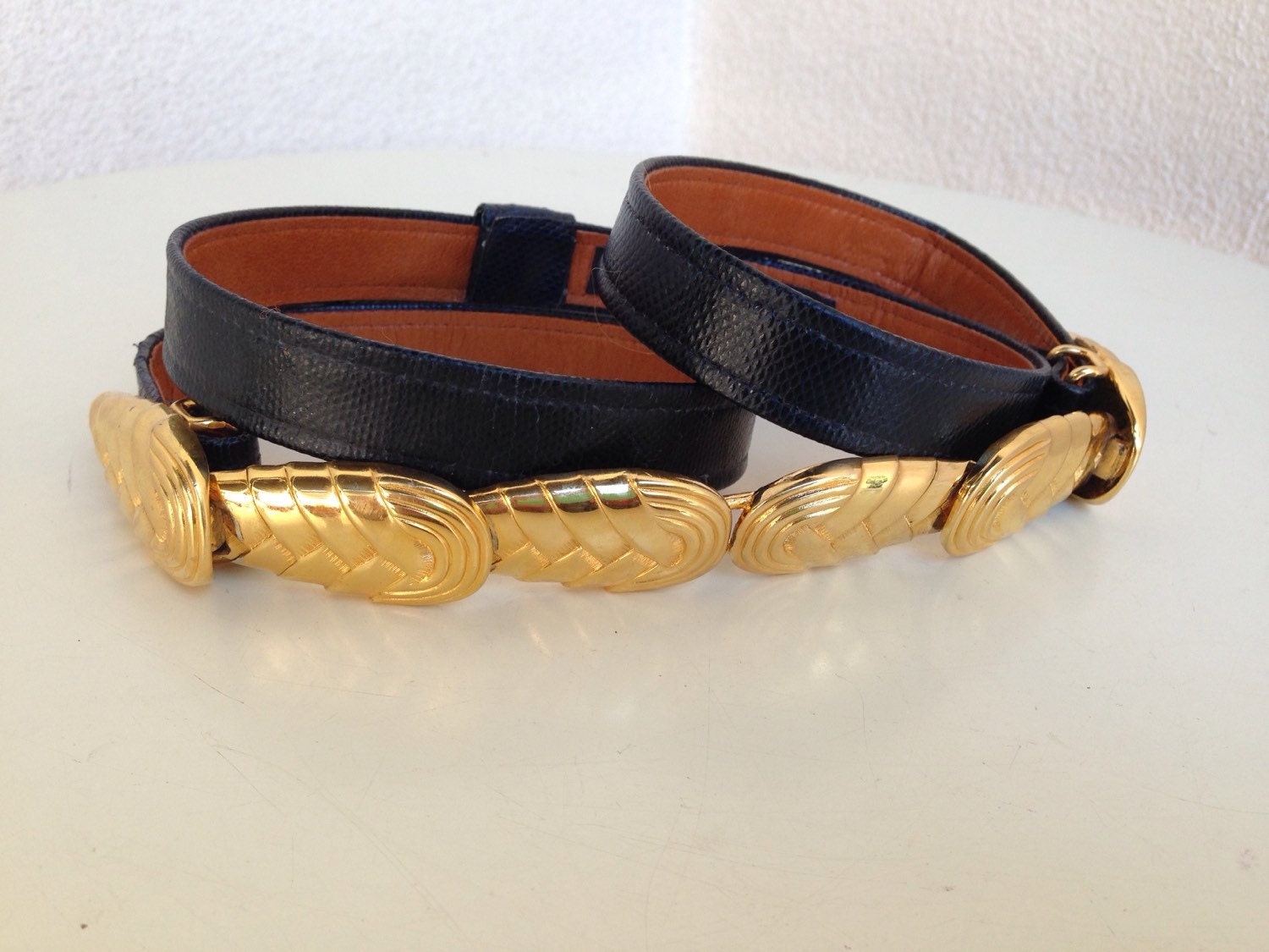 Vintage stunning gold belt buckle with navy blue leather belt