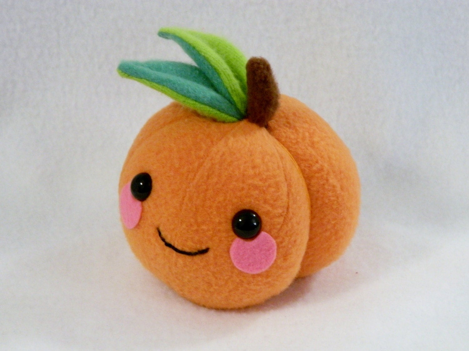 peach and goma stuffed animal