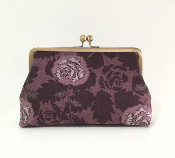 purple and silver clutch