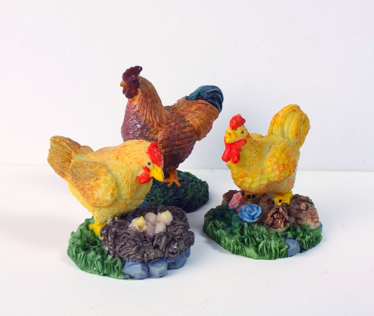 resin roosters and hens