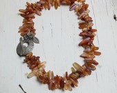 Carmel and butterscotch. Carnelian necklace with flower cluster toggle. OOAK, handmade by ladeDAH! jewelry.