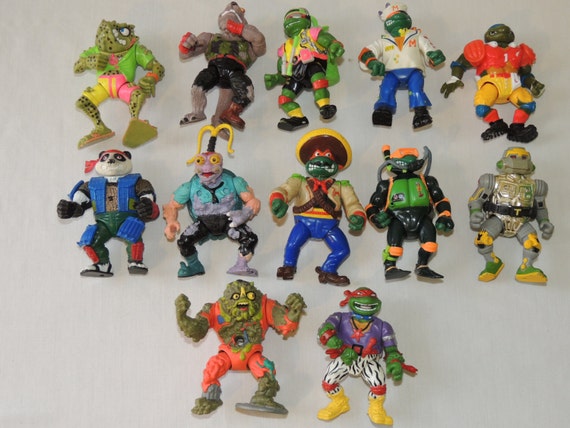 Lot of 12 Teenage Mutant Ninja Turtles TMNT Action Figures