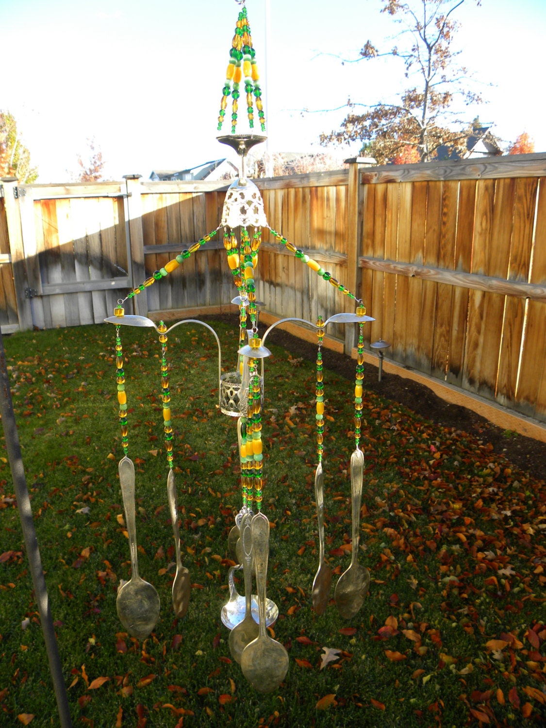 Wind chime art with assorted whimsical silver pieces funky