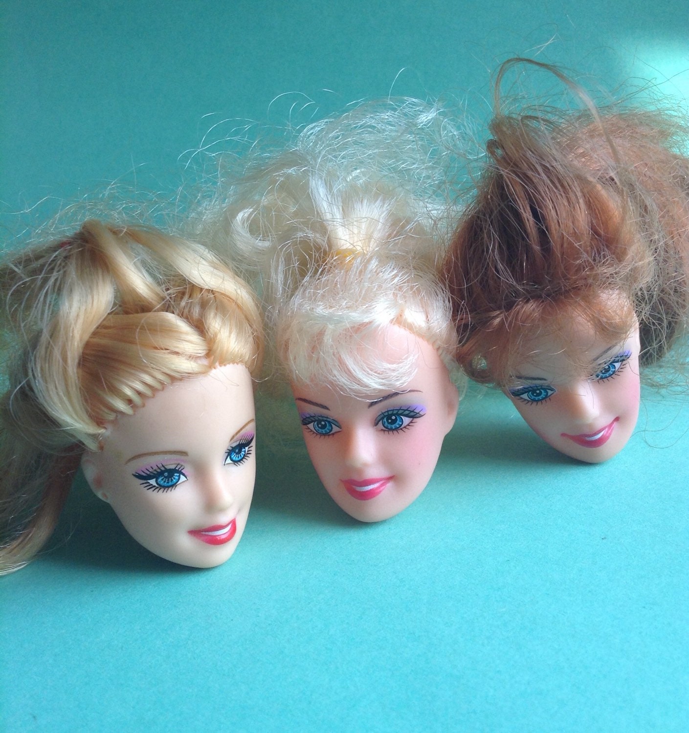 3 Doll Heads rubber / plastic doll parts recycled