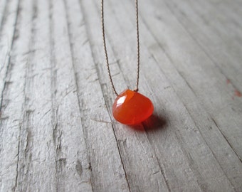ORANGE CARNELIAN floating stone necklace on a fine silk cord dainty gemstone pendant July birthstone necklace