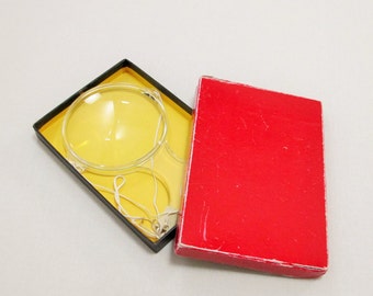vintage handheld magnifying glass
