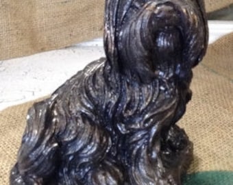 maltese statue dog