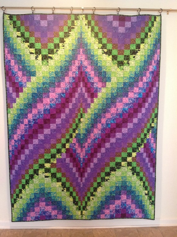 cosmic-twist-bargello-lap-quilt-by-melissasewandsew-on-etsy