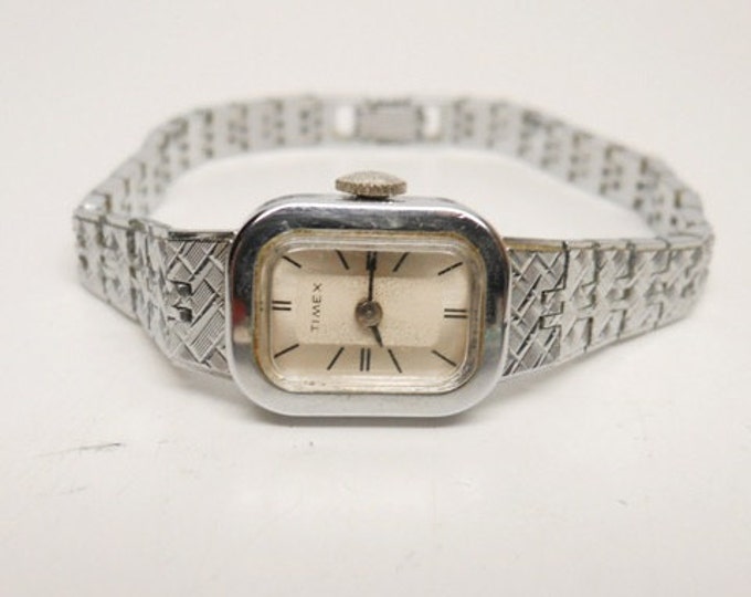 Storewide 25% Off SALE Vintage France Made Ladies Rectangular Bezel Timex Silver Tone Stylish Dress Watch Featuring Original Platinum White