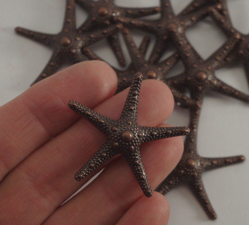 2 Starfish pendants antique copper tone CC5