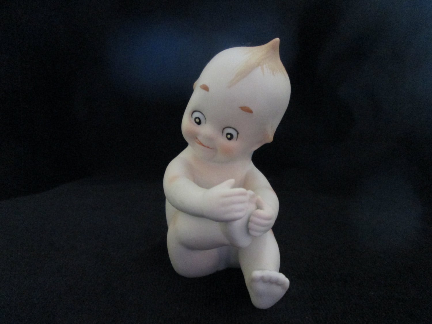 porcelain kewpie doll