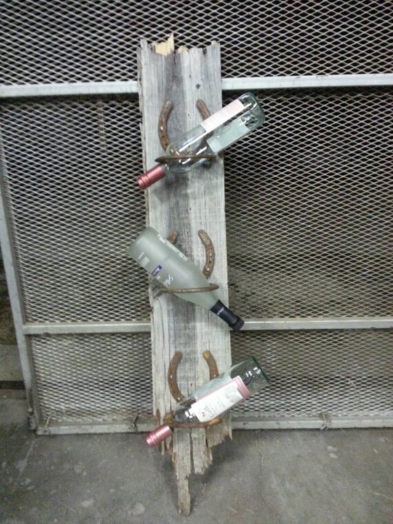 Items similar to Barnwood Horseshoe 3 bottle wine rack on Etsy