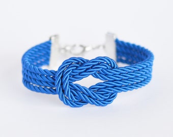 Royal blue forever knot nautical rope bracelet with silver anchor charm