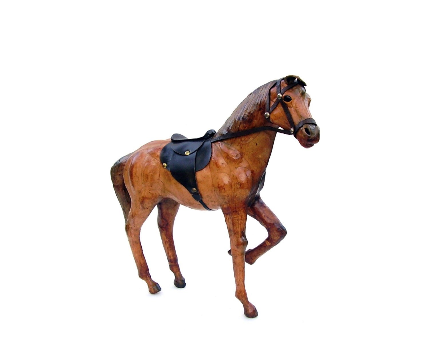 antique leather horse figurine