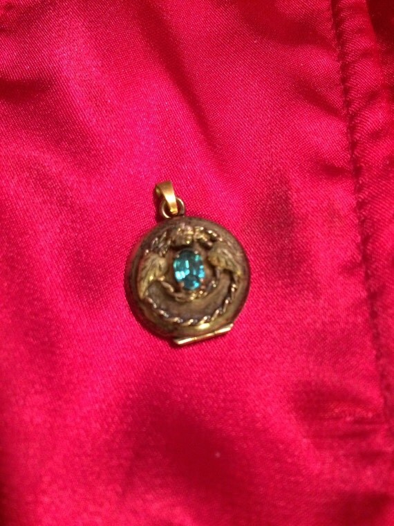 Vintage gold tone locket charm blue stone by ThelmaThrift on Etsy