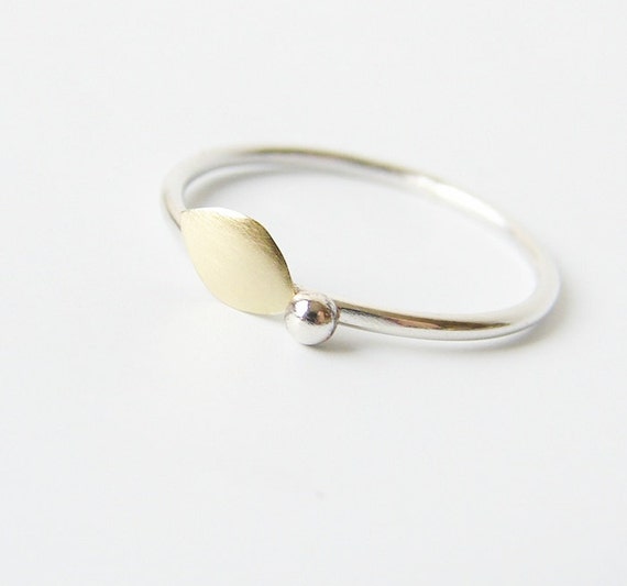 Delicate ring. Sterling silver and gold tone brass leaf.