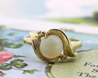 Opal engagement rings nz