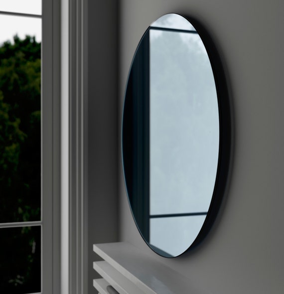 Items similar to Blue glass mirror. MidCentury inspired wall mirror