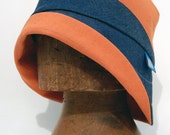 Asymmetric two tone denim and orange cloche hat