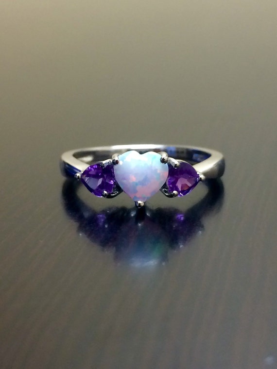 Opal heart engagement rings