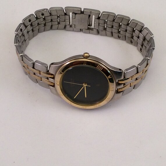 gold citizen watch black face