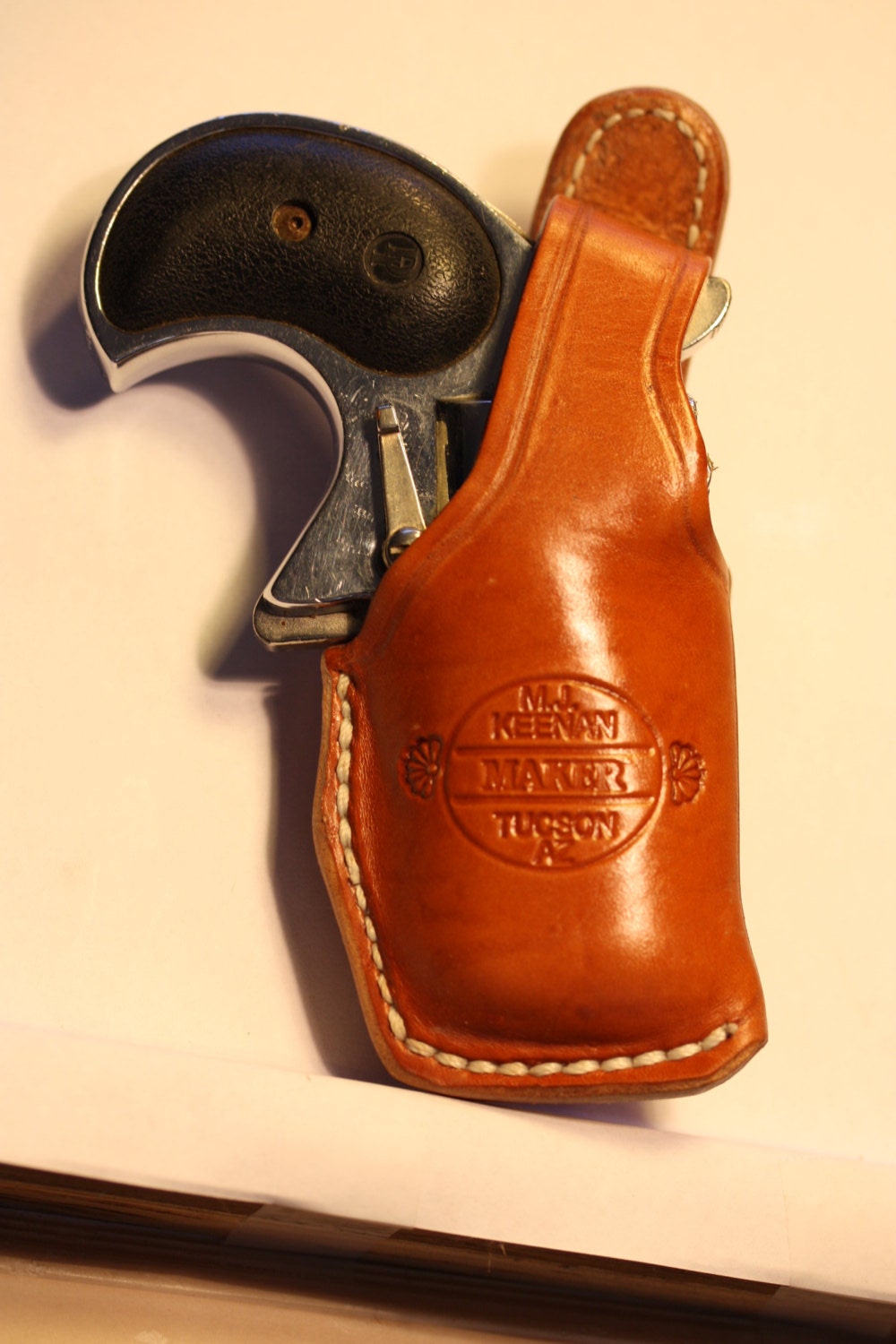 Leather clip style holster for Cobra/Davis Big Bore derringer