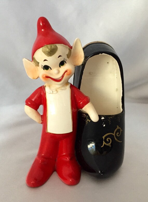 Vintage kitschy ceramic elf with shoe figurine