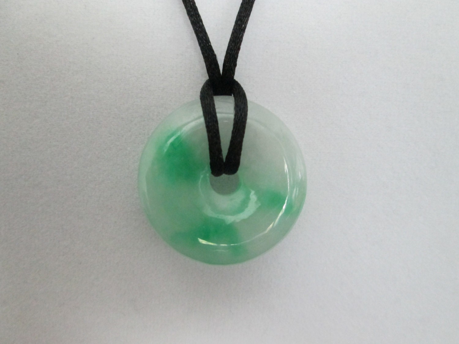 Jade disc on black silk cord necklace pendant Father's