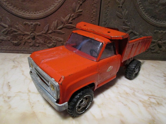 Vintage 1960s orange Tonka dump truck