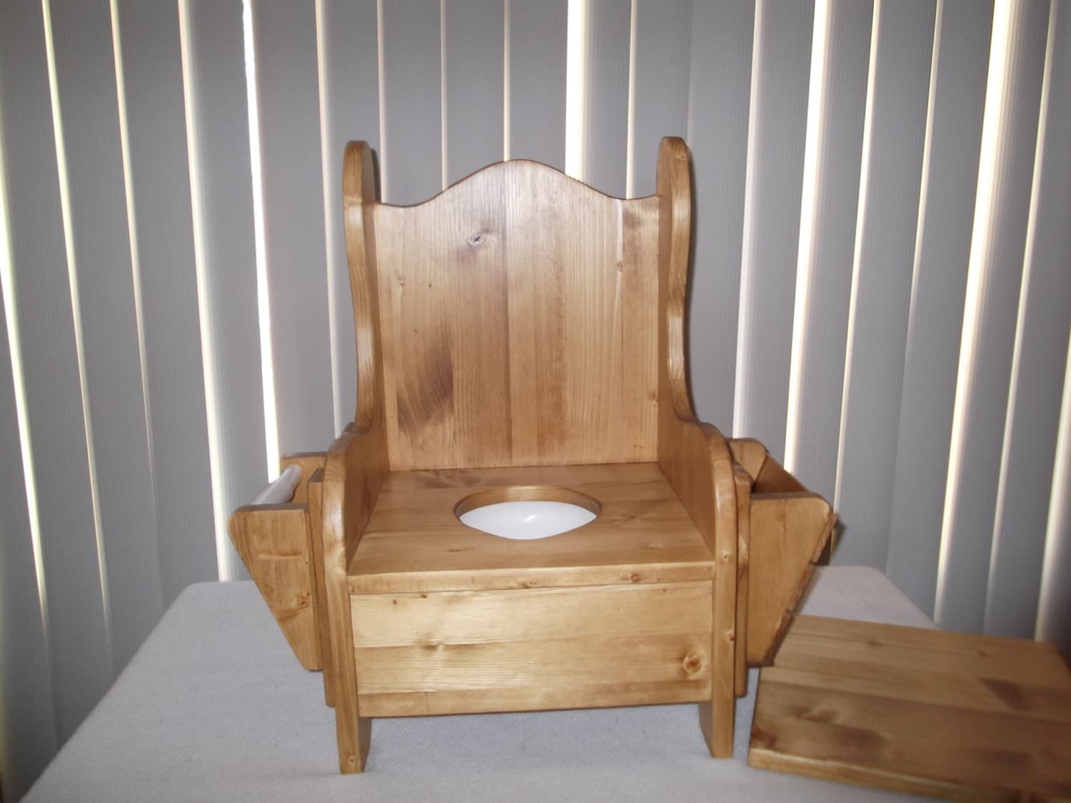 wooden-potty-chair-w-tp-holder-and-book-rack