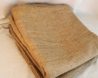 Two, jute coffee bean bags. Two authentic coffee bean bags. Coffee bean bag fabric.