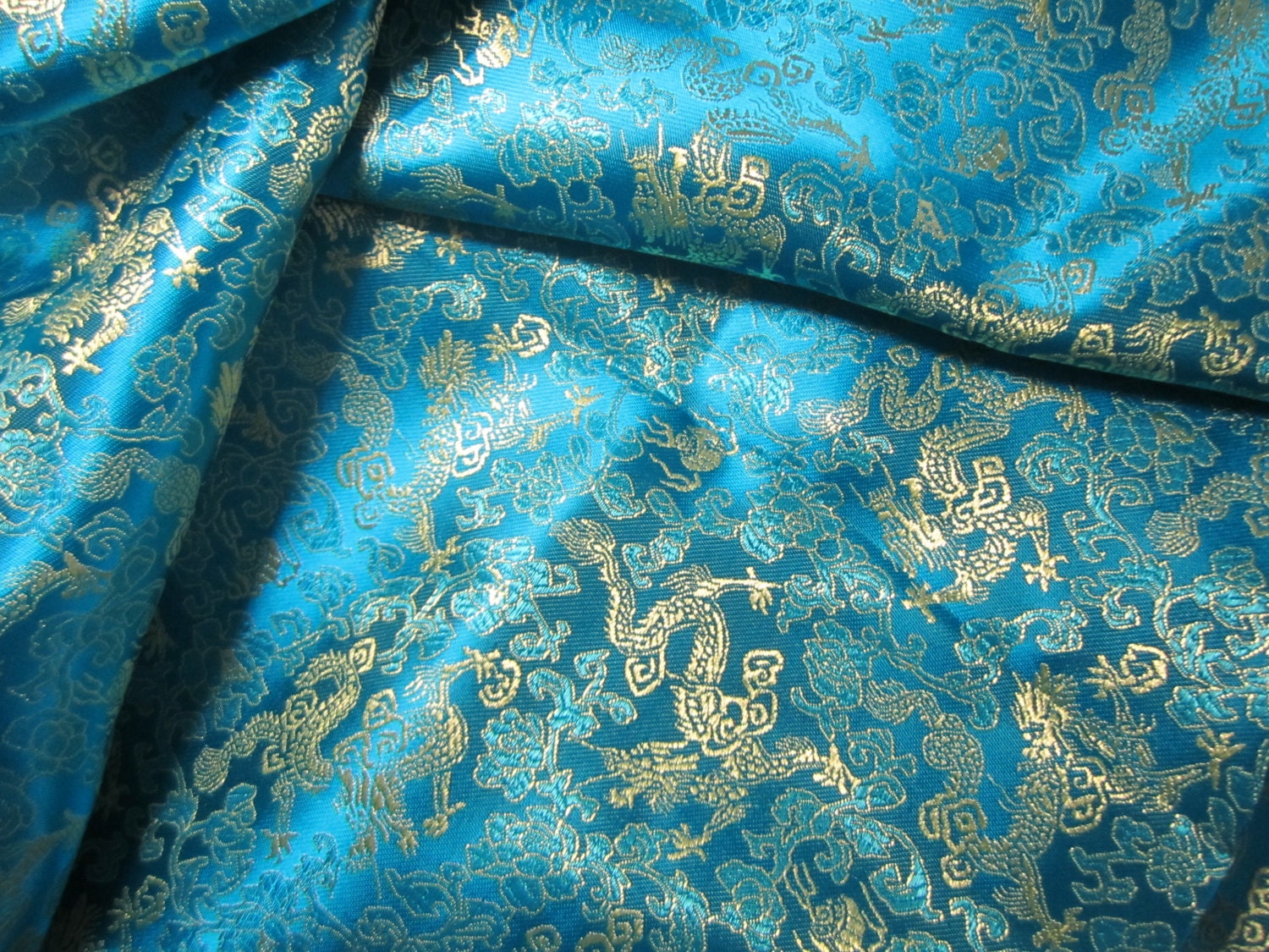 Chinese brocade fabric in turquoise with gold dragons ONE
