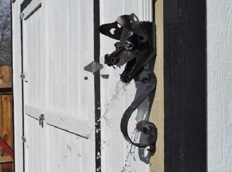 A Gothic style true Gargoyle roof drain downspout by Sistersteel