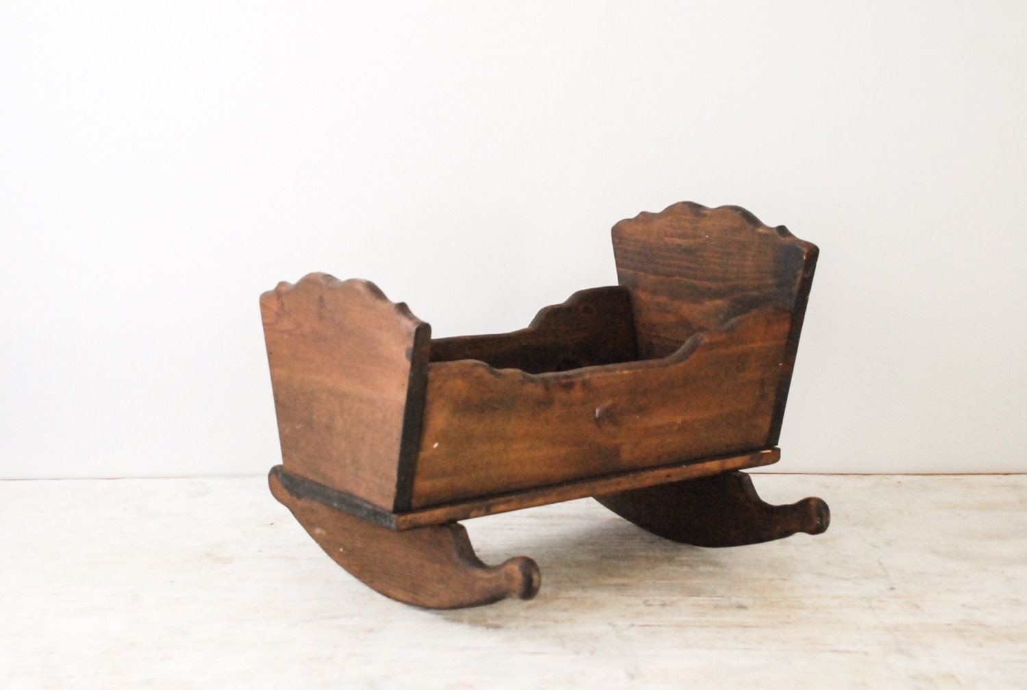 vintage wooden rocking cradle