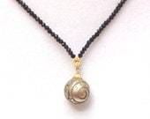 Tahitian carved pearl necklace 18ky gold & black spinel  beads