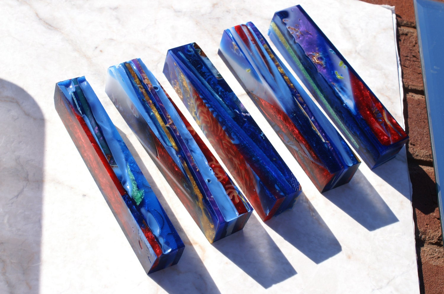 multi layered alumilite resin pen blanks made with dyed