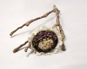 Crochet brooch with fossil coral gemstone cabochon.High quality crochet brooch. With antic lace