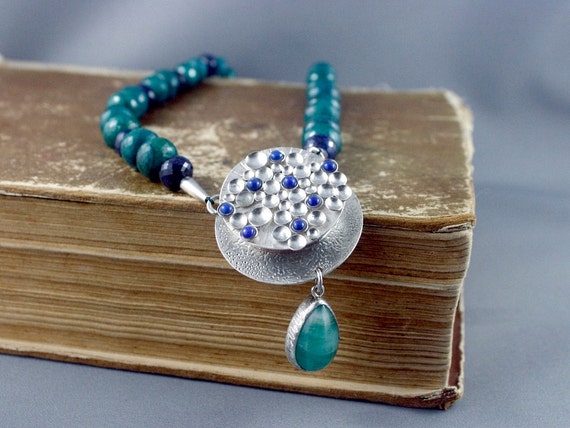 Emerald necklace. Emeralds and sapphires. Pendant clasp necklace, sterling silver