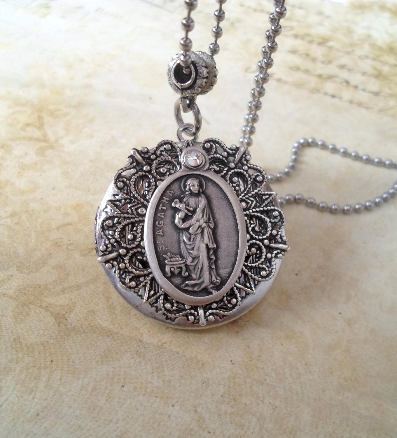 St. Agatha Locket Necklace Patron Saint of by FindYourFeeling