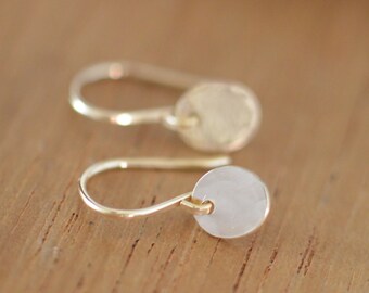 small gold disc earrings. 14K yellow gold filled earrings. gold drop earrings. modern simple gold earrings. modern simple gold earrings